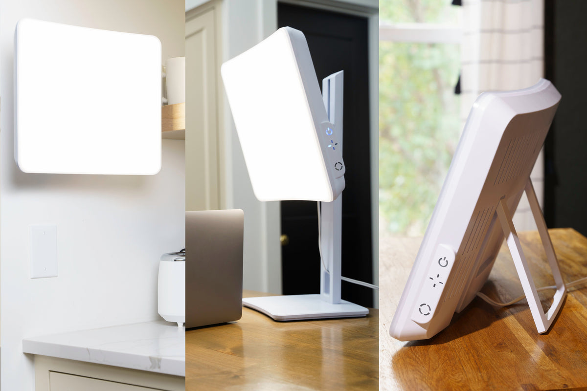Day-Light Elite light therapy lamp on a table by a window